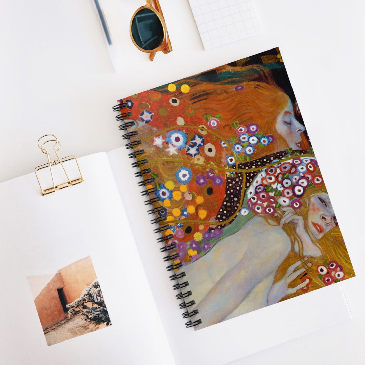 Abstract Women and Flowers Spiral Notebook Displayed on Desk
