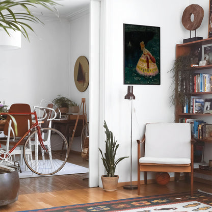 Eclectic living room with a road bike, bookshelf and house plants that features framed artwork of a Vintage Story Book above a chair and lamp