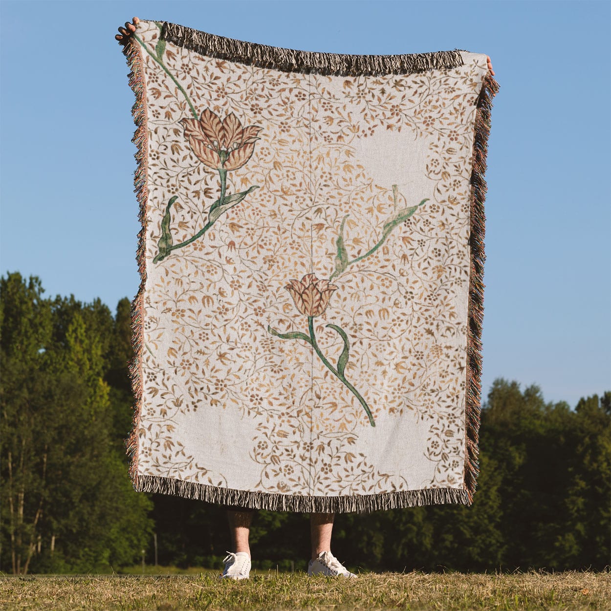 Aesthetic Floral Woven Blanket Held Up Outside