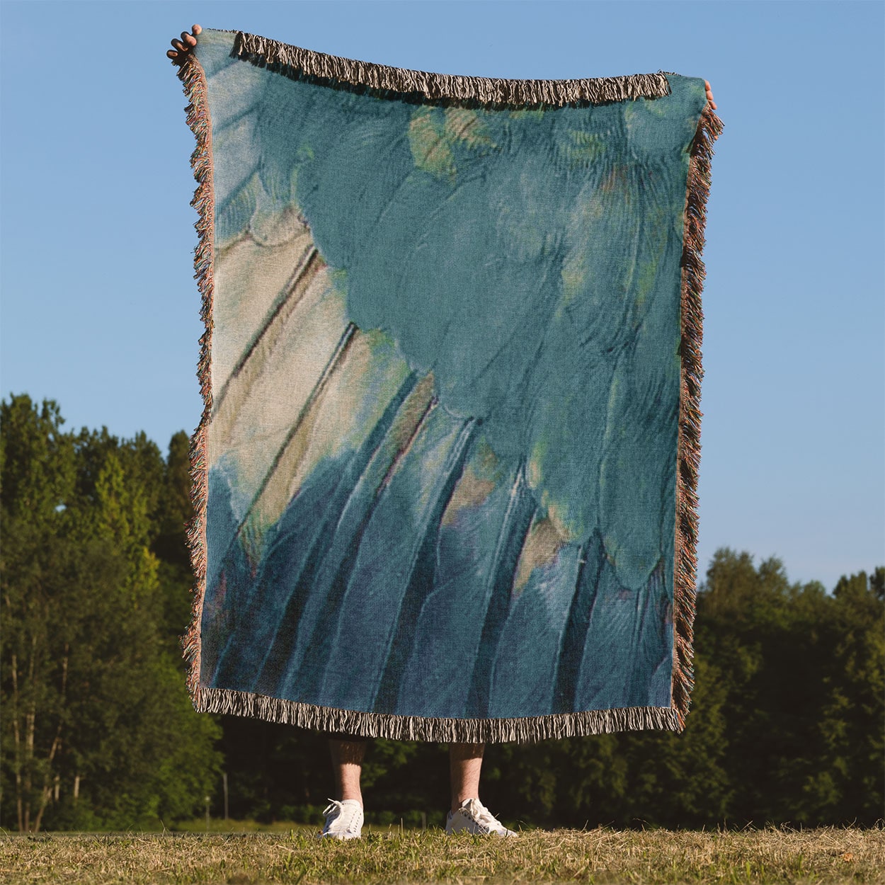 Aesthetic Wing Woven Throw Blanket Held Up Outside