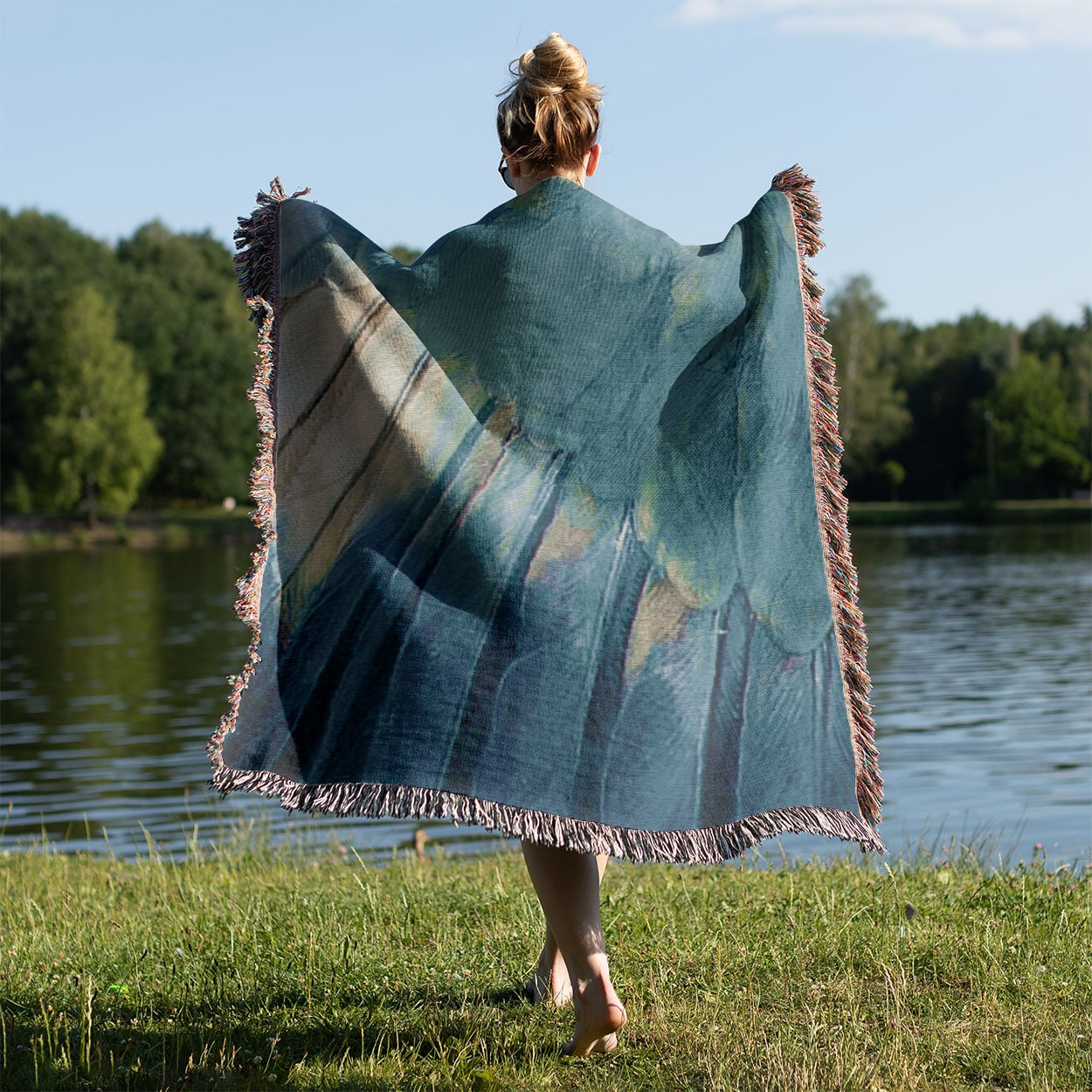 Aesthetic Wing Woven Blanket Held on a Woman's Back Outside