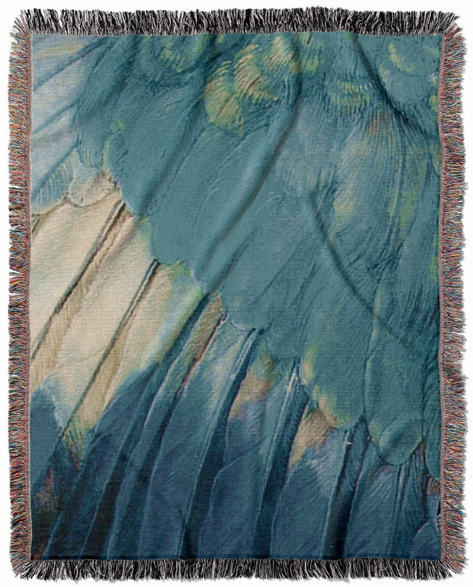 Aesthetic Wing woven throw blanket, made of 100% cotton, delivering a soft and cozy texture with beautiful blue feathers for home decor.