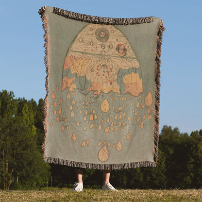 Aincent Drawing of the Earth Woven Blanket Held Up Outside