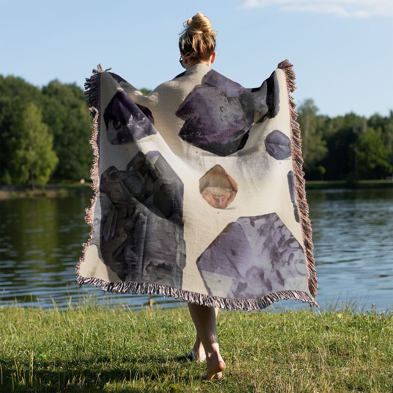 Light Green Gemstone Woven Throw Blanket Held on a Woman's Back Outside