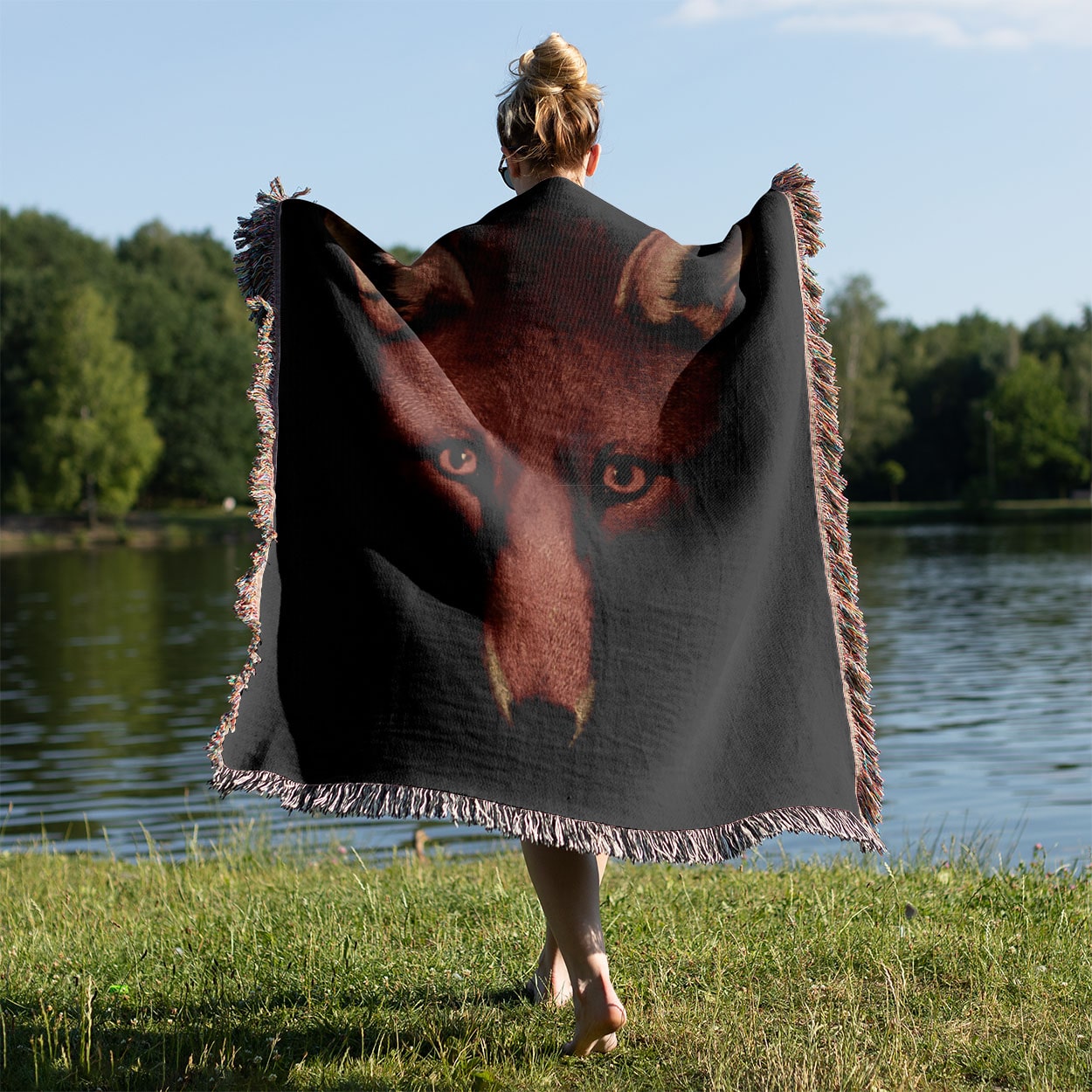 Animal Portrait Woven Blanket Held on a Woman's Back Outside
