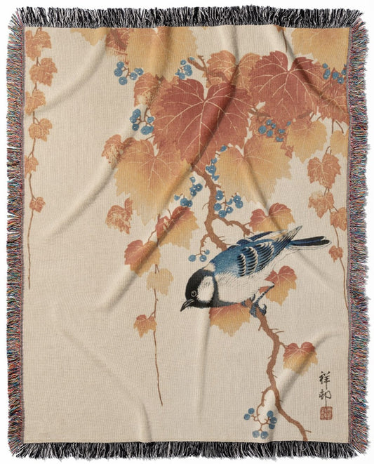 Japanese Birds woven throw blanket, made of 100% cotton, featuring a soft and cozy texture with an autumn leaves design for home decor.