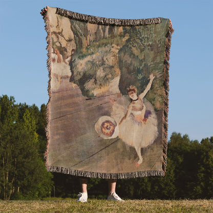 Ballerina Woven Blanket Held Up Outside