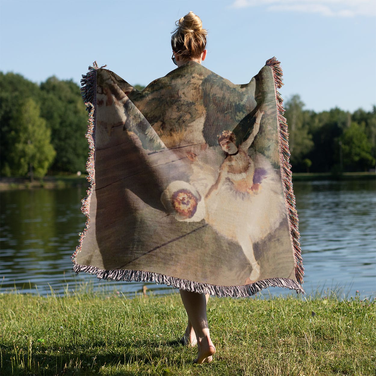 Ballerina Woven Blanket Held on a Woman's Back Outside