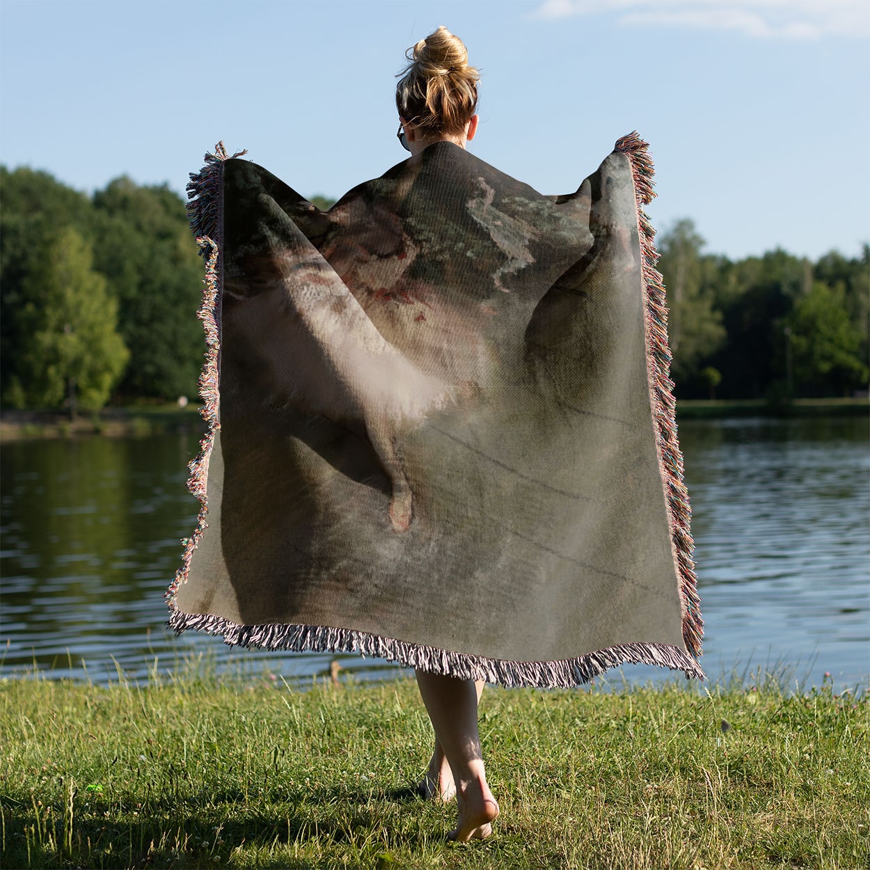 Ballerina Woven Blanket Held on a Woman's Back Outside