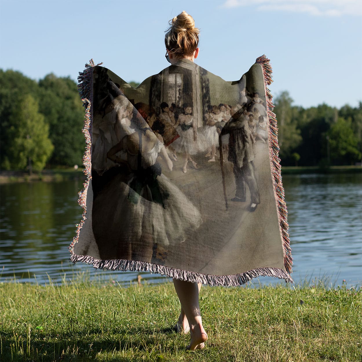 Ballerina Woven Blanket Held on a Woman's Back Outside