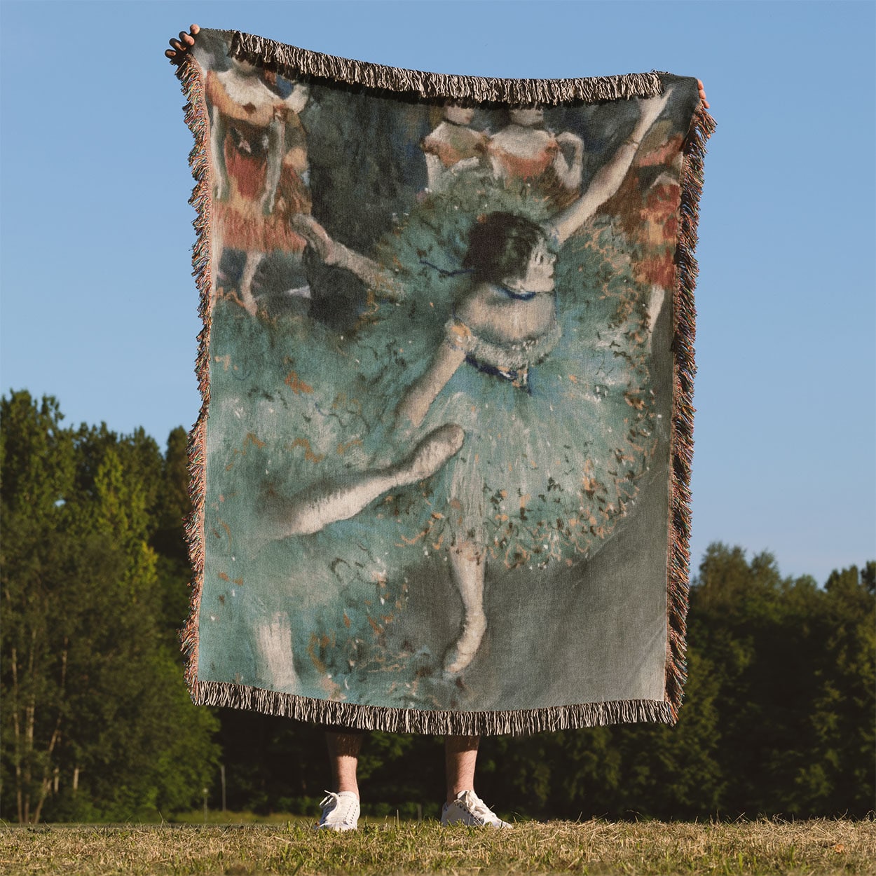 Ballet Painting Woven Blanket Held Up Outside