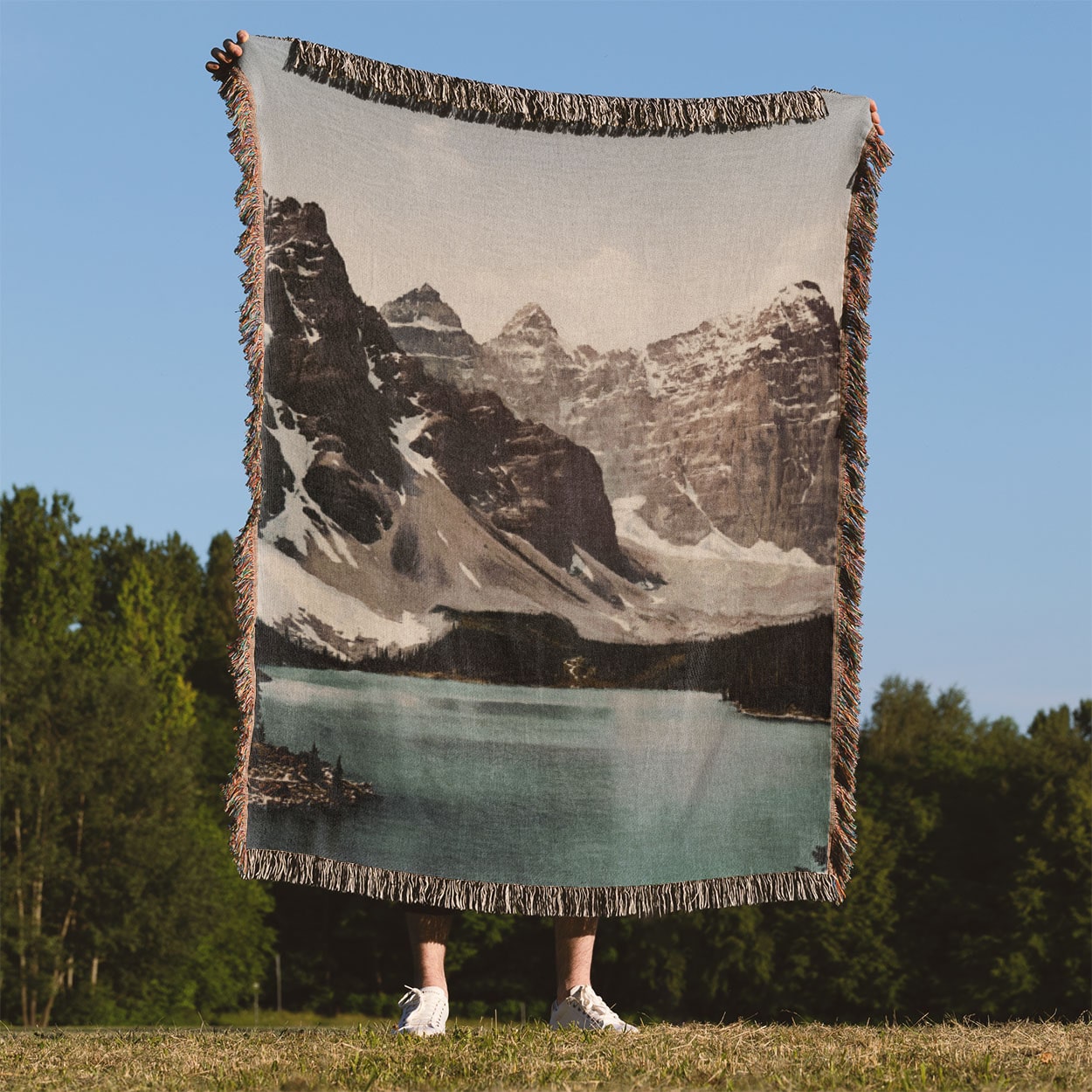 Banff National Park Woven Blanket Held Up Outside