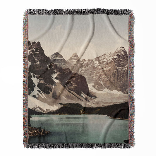 Banff National Park woven throw blanket, crafted from 100% cotton, providing a soft and cozy texture with mountain scenery for home decor.