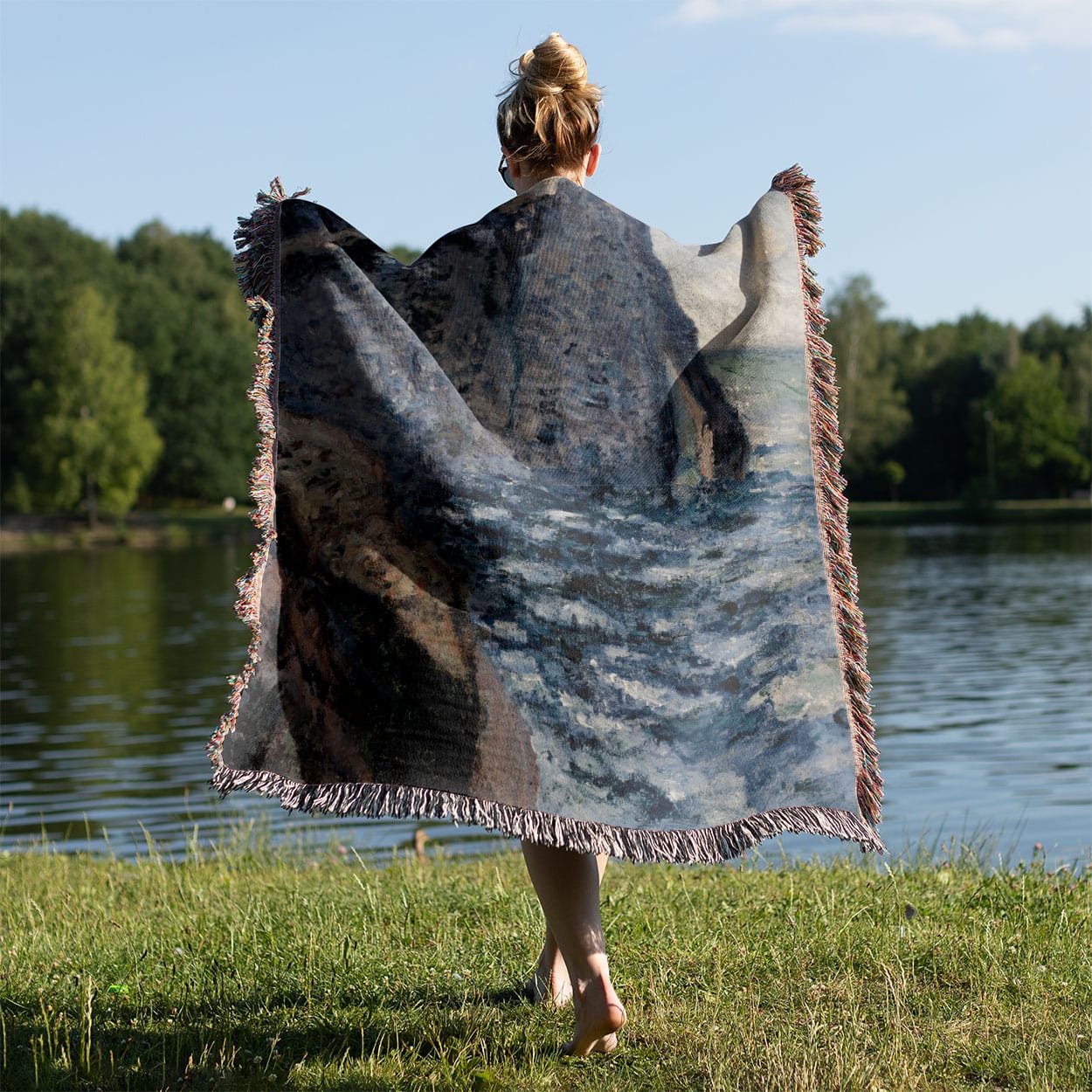 Beach Woven Throw Blanket Held on a Woman's Back Outside