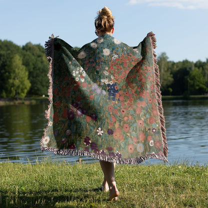 Beautiful Flowers Woven Blanket Held on a Woman's Back Outside