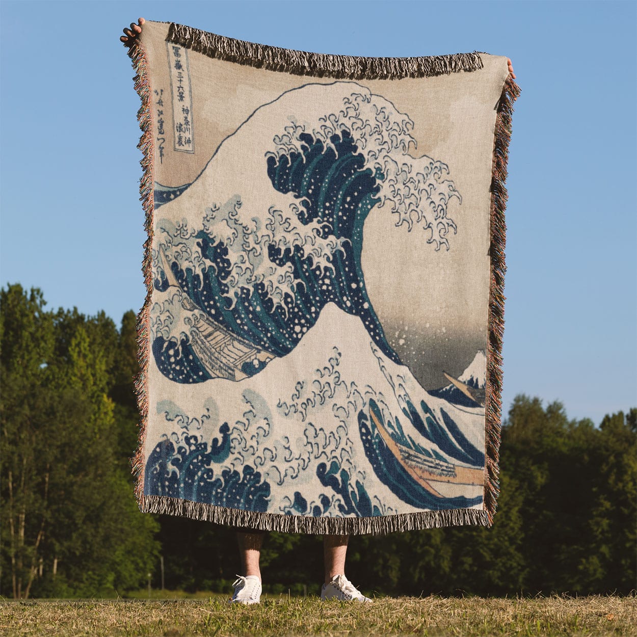 Big Wave Woven Throw Blanket Held Up Outside