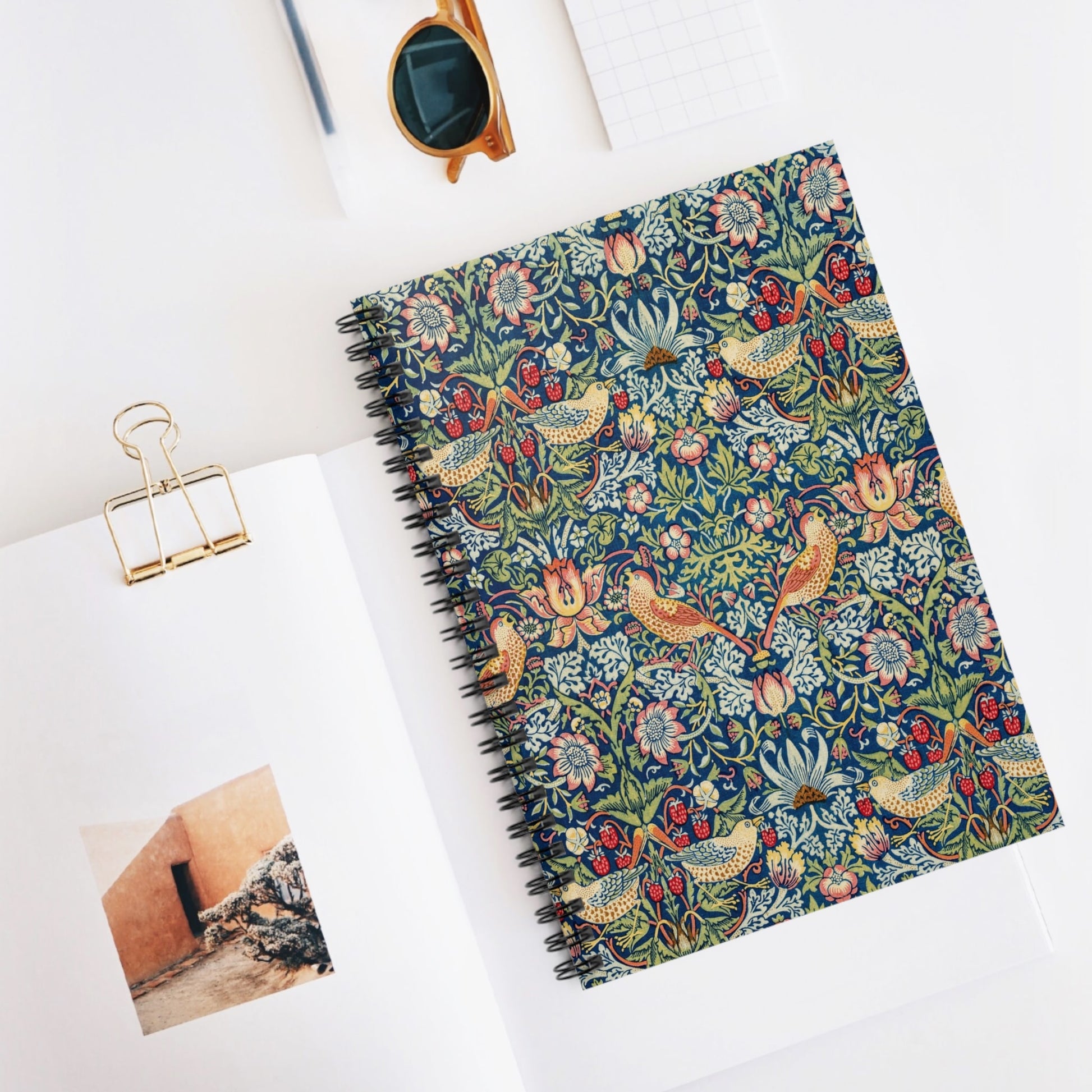 Birds and Plants Spiral Notebook Displayed on Desk