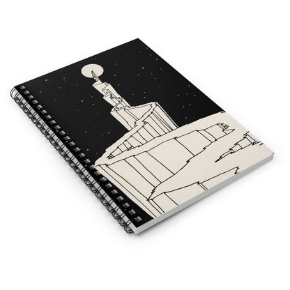 Black and White Fantasy Spiral Notebook Laying Flat on White Surface
