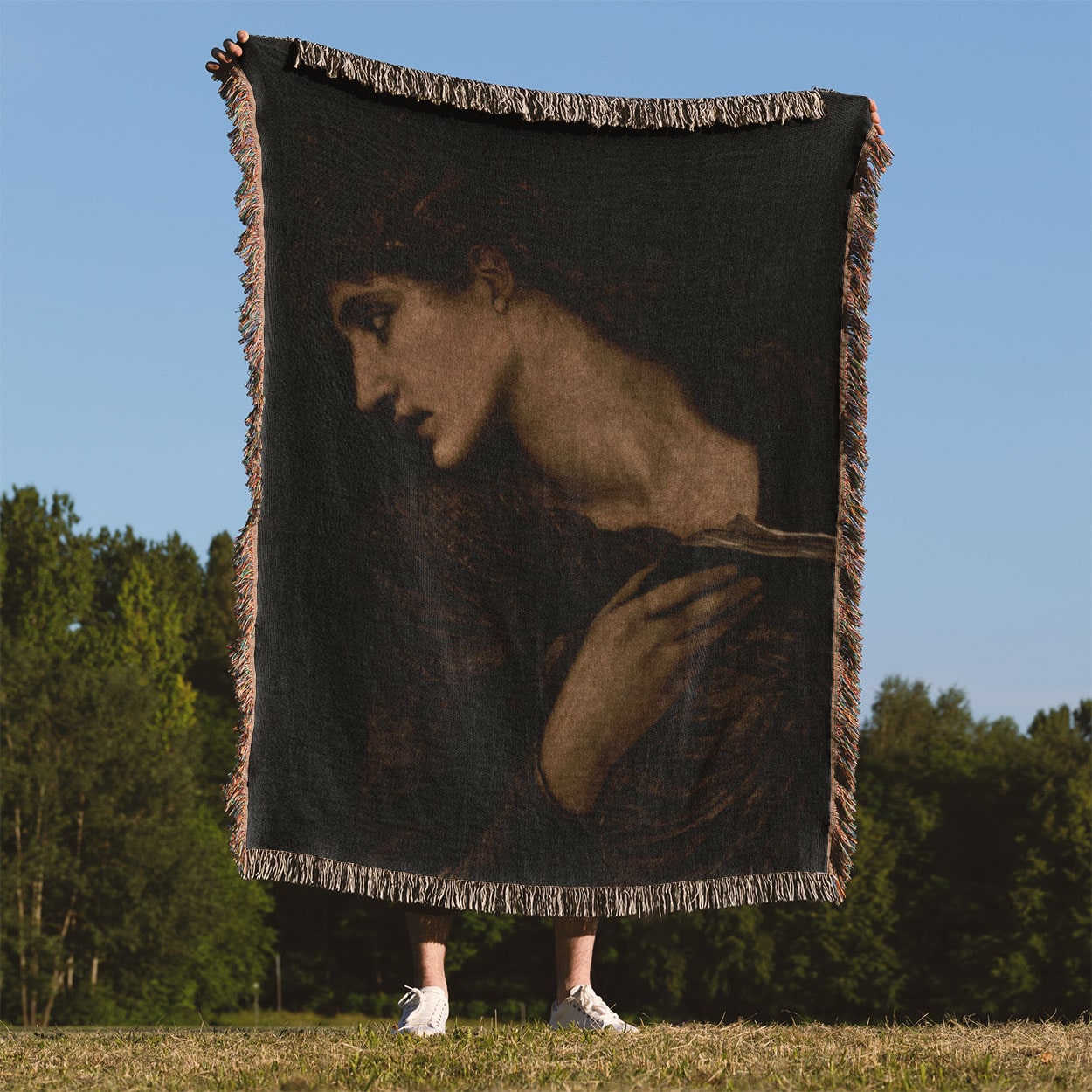 Black and White Moody Woven Throw Blanket Held Up Outside