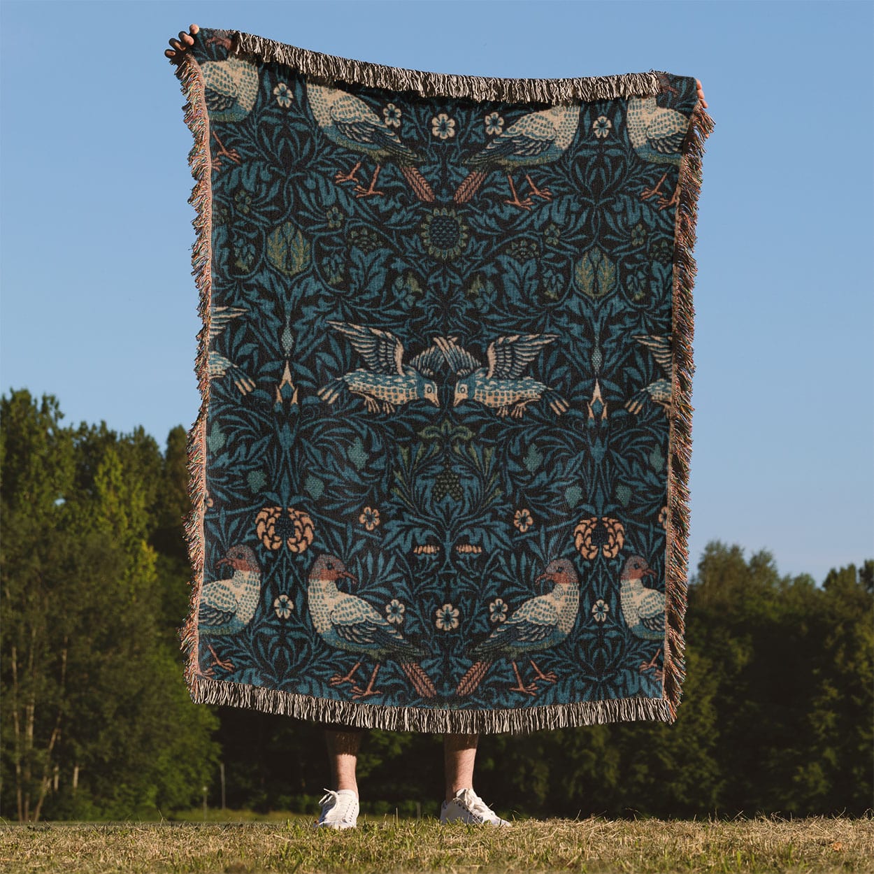 Blue Nature Pattern Woven Blanket Held Up Outside