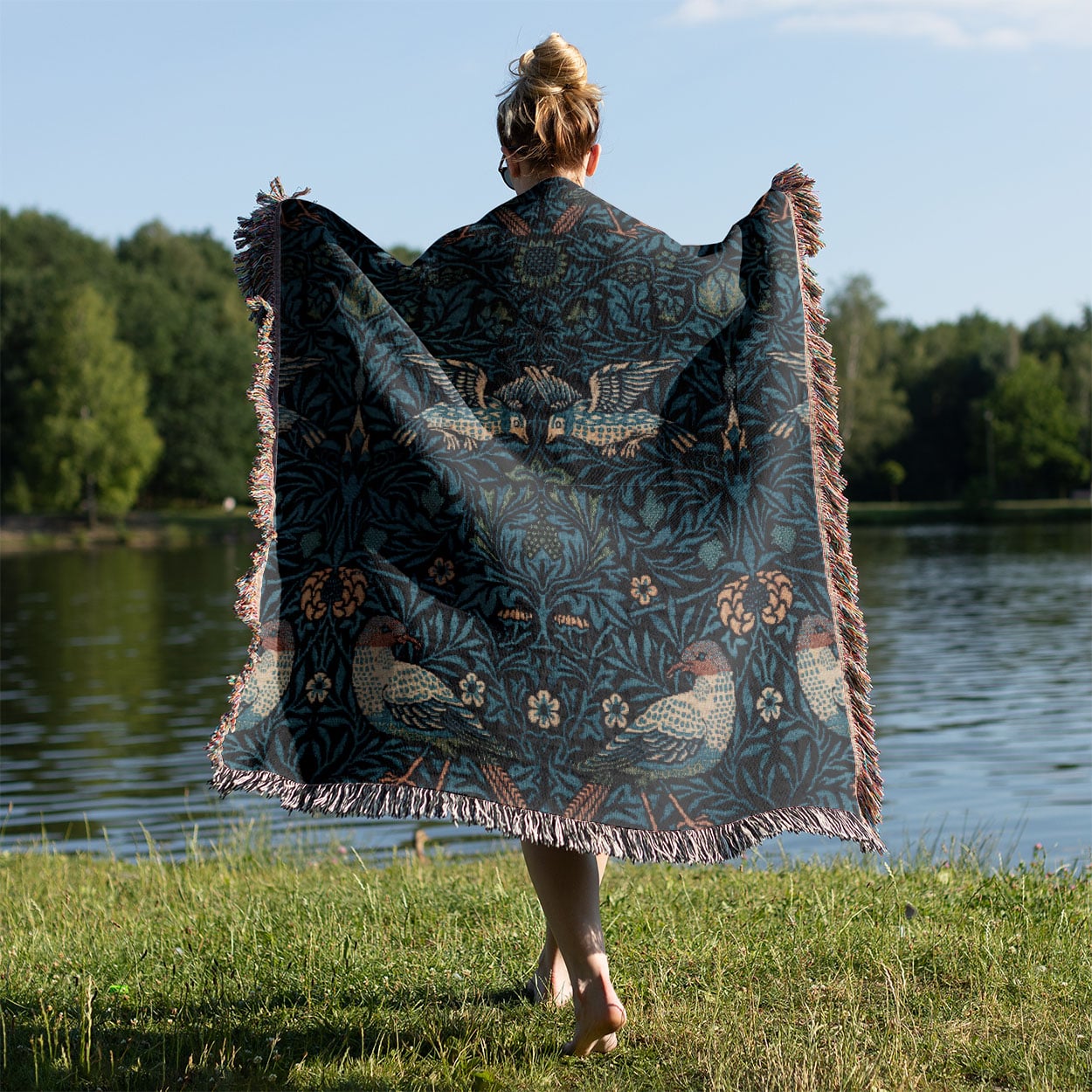 Blue Nature Pattern Woven Blanket Held on a Woman's Back Outside