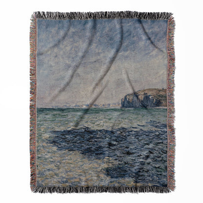 Blue Ocean woven throw blanket, made with 100% cotton, providing a soft and cozy texture with a relaxing nautical theme for home decor.