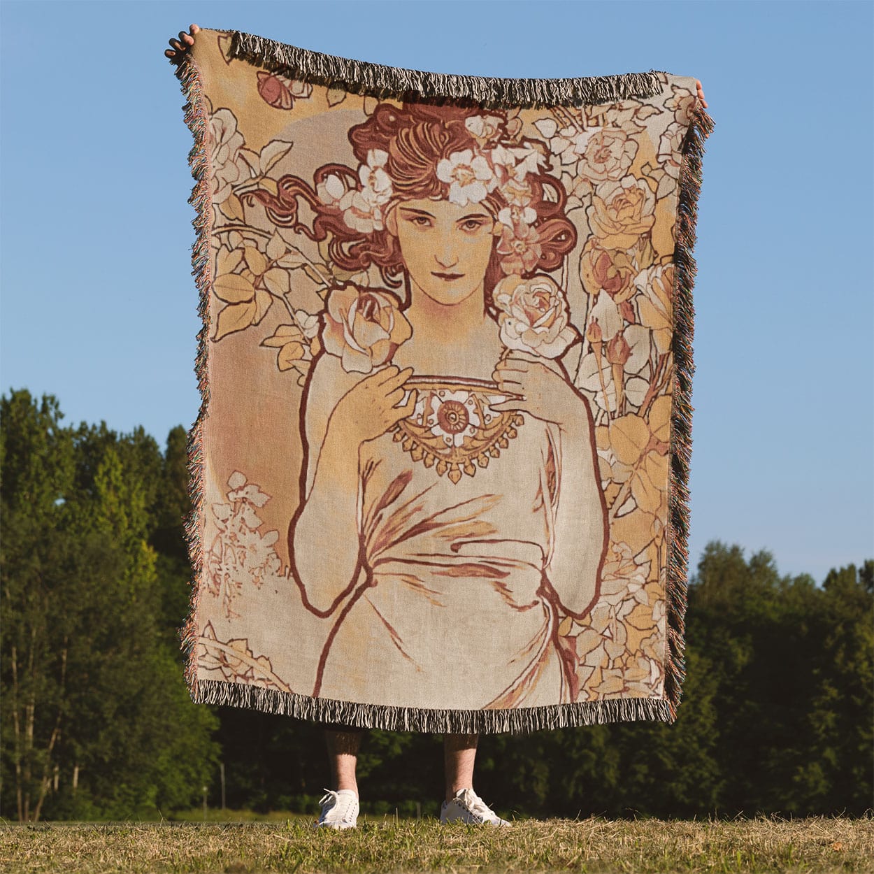 Bohemian Flower Woven Blanket Held Up Outside