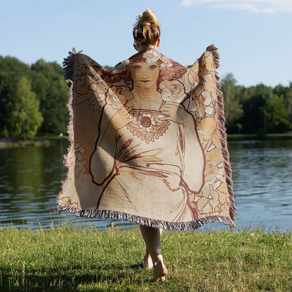 Bohemian Flower Woven Blanket Held on a Woman's Back Outside