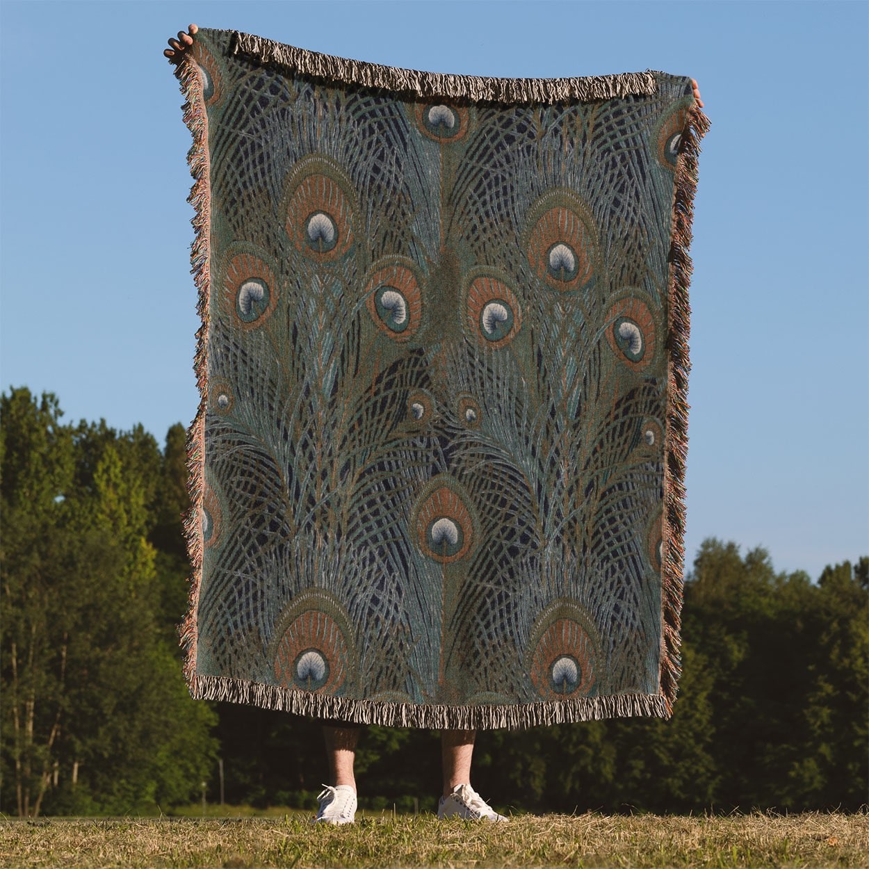 Boho Aesthetic Woven Blanket Held Up Outside