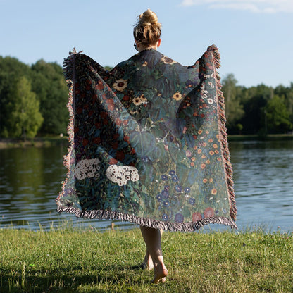 Boho Flower Painting Woven Blanket Held on a Woman's Back Outside