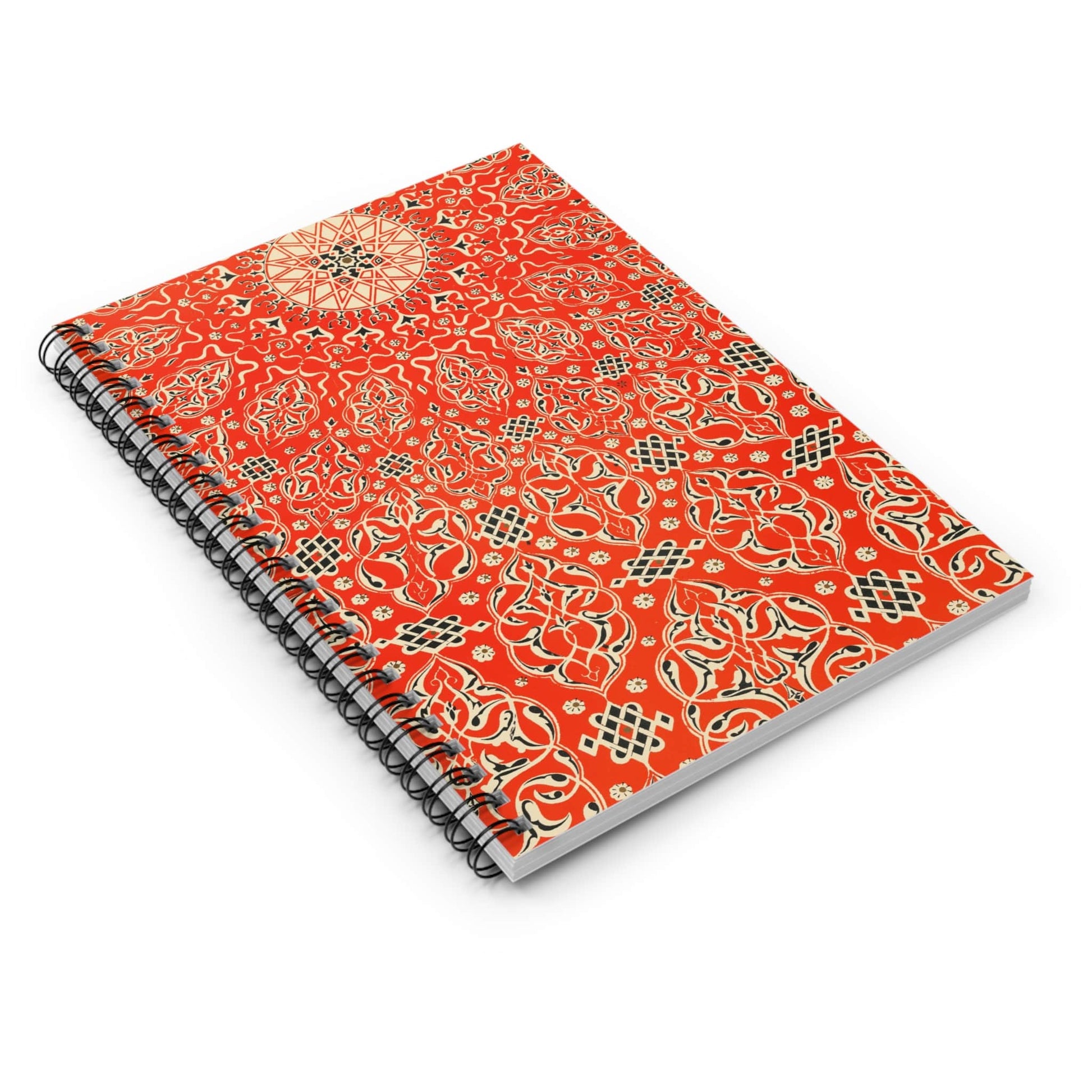 Bright Red Pattern Spiral Notebook Laying Flat on White Surface