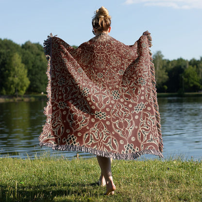 Bright Red Pattern Woven Blanket Held on a Woman's Back Outside