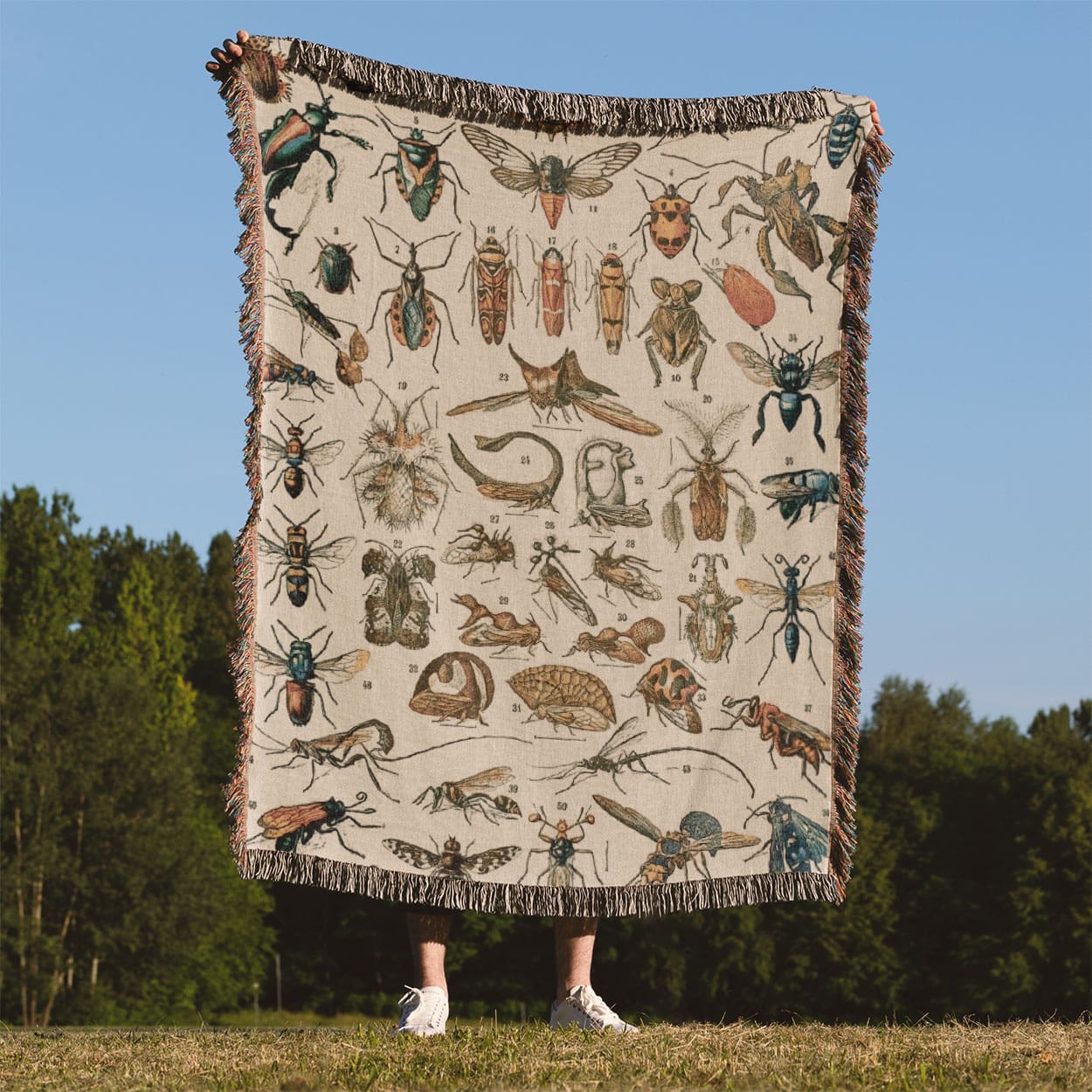 Bugs and Insects Woven Blanket Held Up Outside