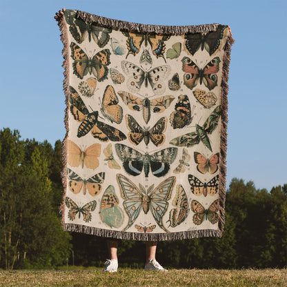 Butterflies Woven Blanket Held Up Outside