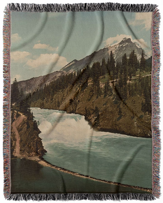 Canada Landscape woven throw blanket, made with 100% cotton, providing a soft and cozy texture with a Banff National Park theme for home decor.