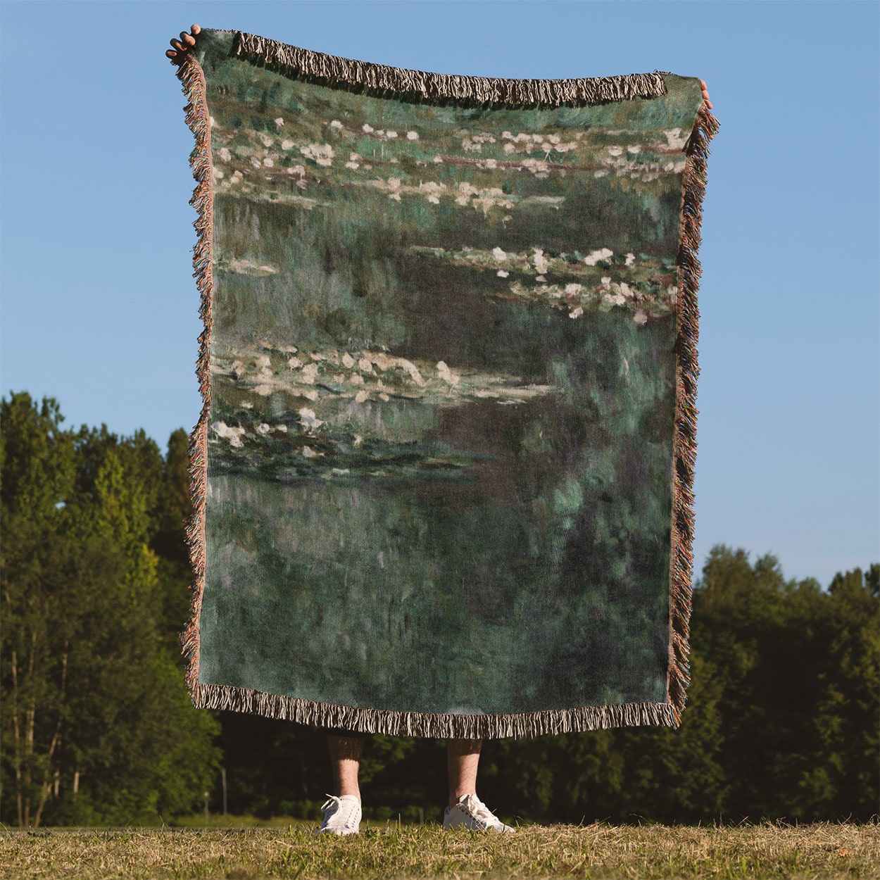 Classical Water Lilies Woven Blanket Held Up Outside