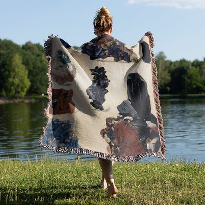 Colorful Gemstone Woven Blanket Held on a Woman's Back Outside