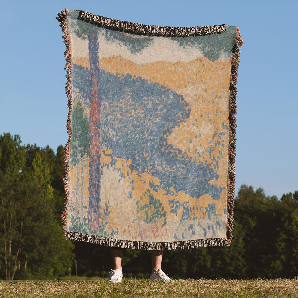 Colorful Landscape Woven Throw Blanket Held Up Outside