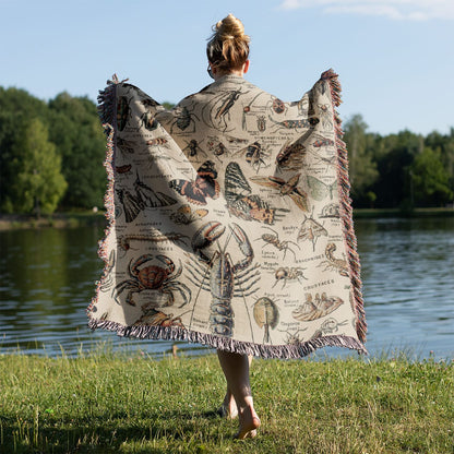 Cool Insect Woven Blanket Held on a Woman's Back Outside