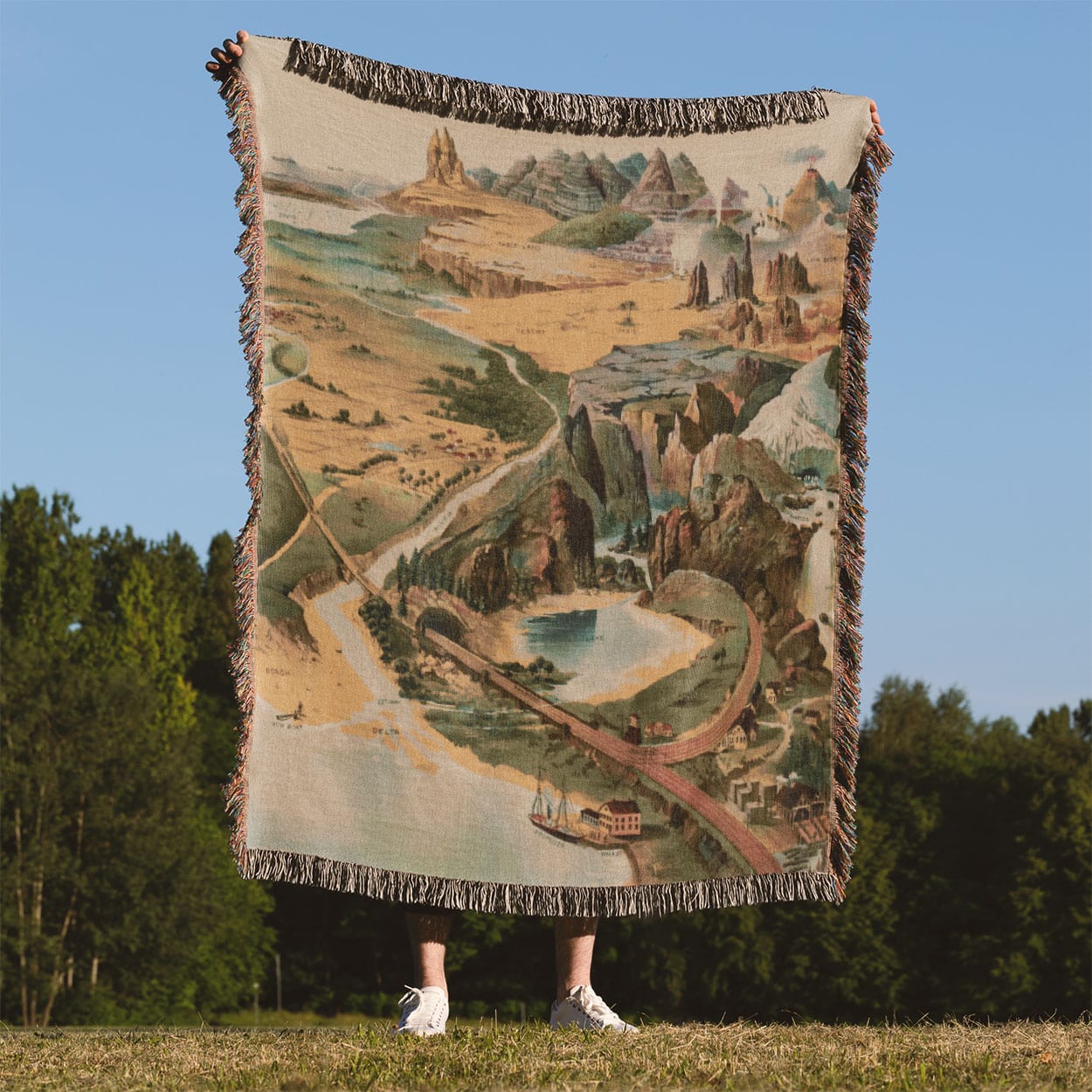 Cool Landscape Woven Blanket Held Up Outside