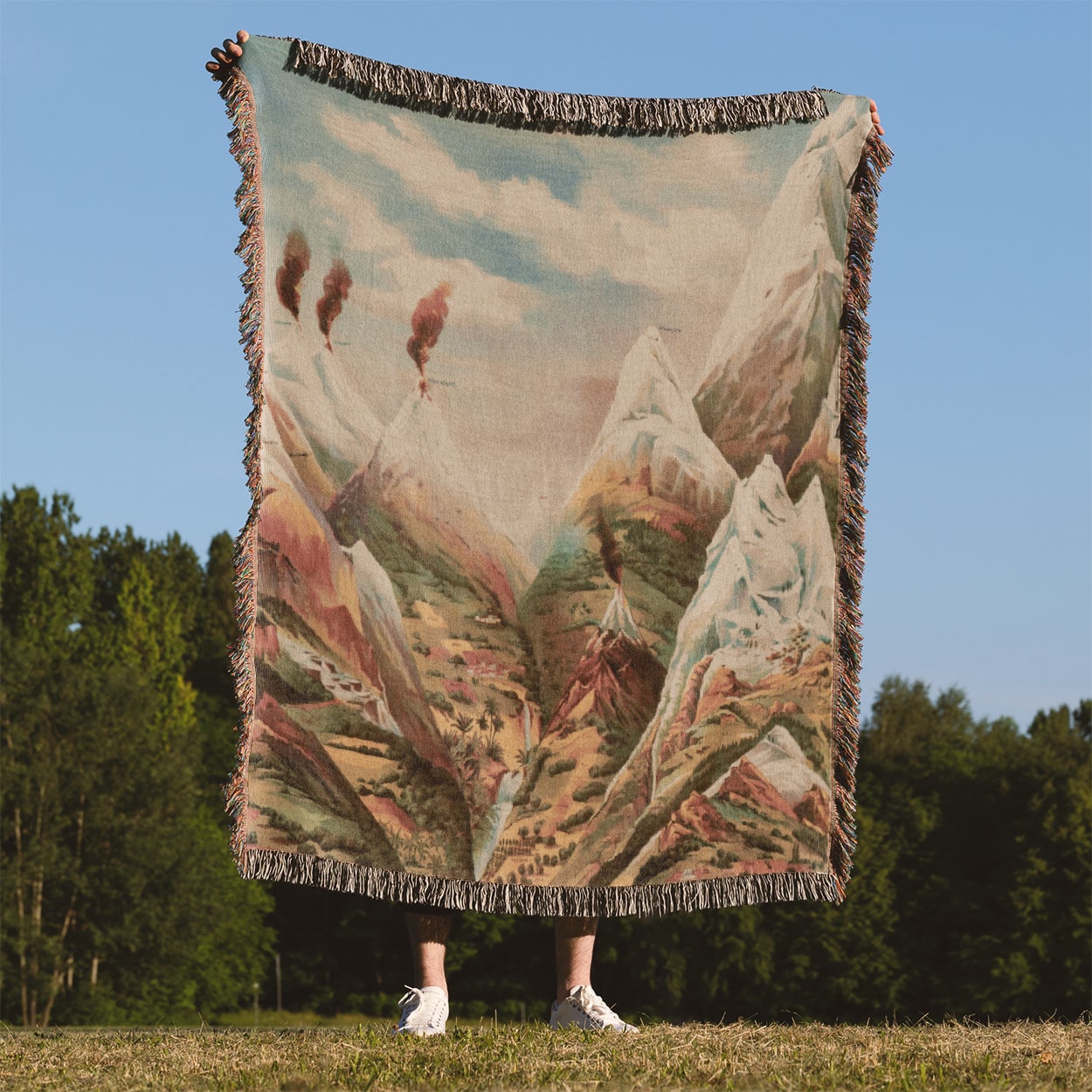 Cool Mountain Painting Woven Throw Blanket Held Up Outside