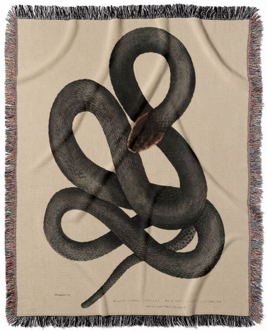 Cool Snake woven throw blanket, crafted from 100% cotton, offering a soft and cozy texture with a black cobra capella design for home decor.