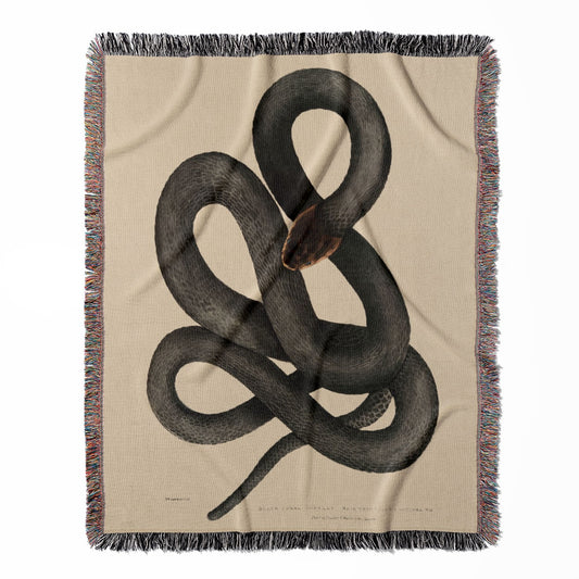 Cool Snake woven throw blanket, crafted from 100% cotton, offering a soft and cozy texture with a black cobra capella design for home decor.