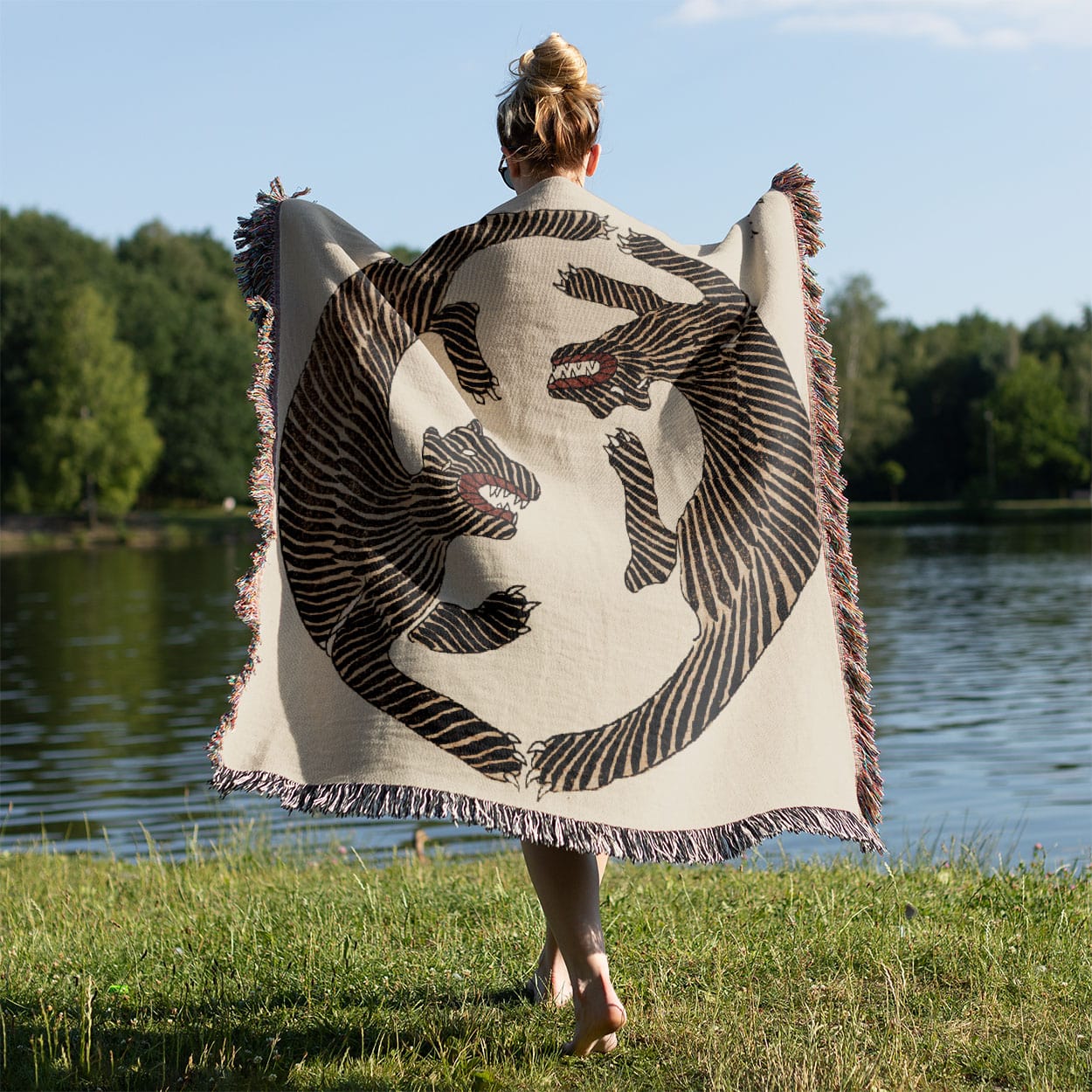 Cool Tiger Woven Blanket Held on a Woman's Back Outside