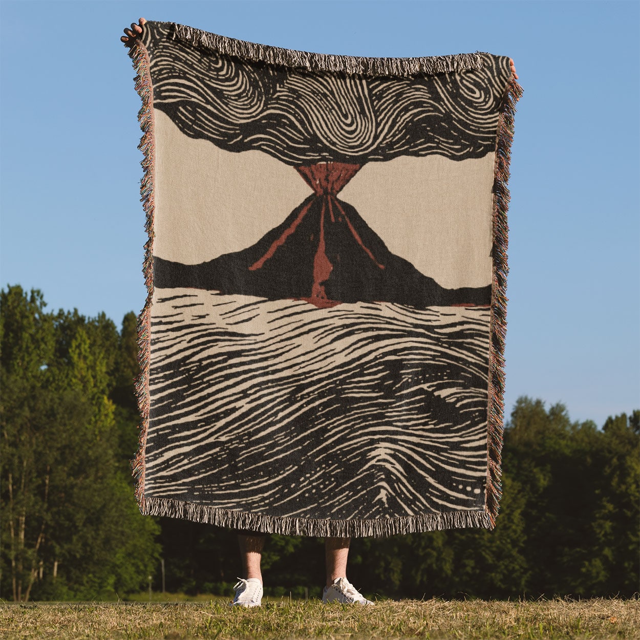 Cool Volcano Drawing Woven Blanket Held Up Outside