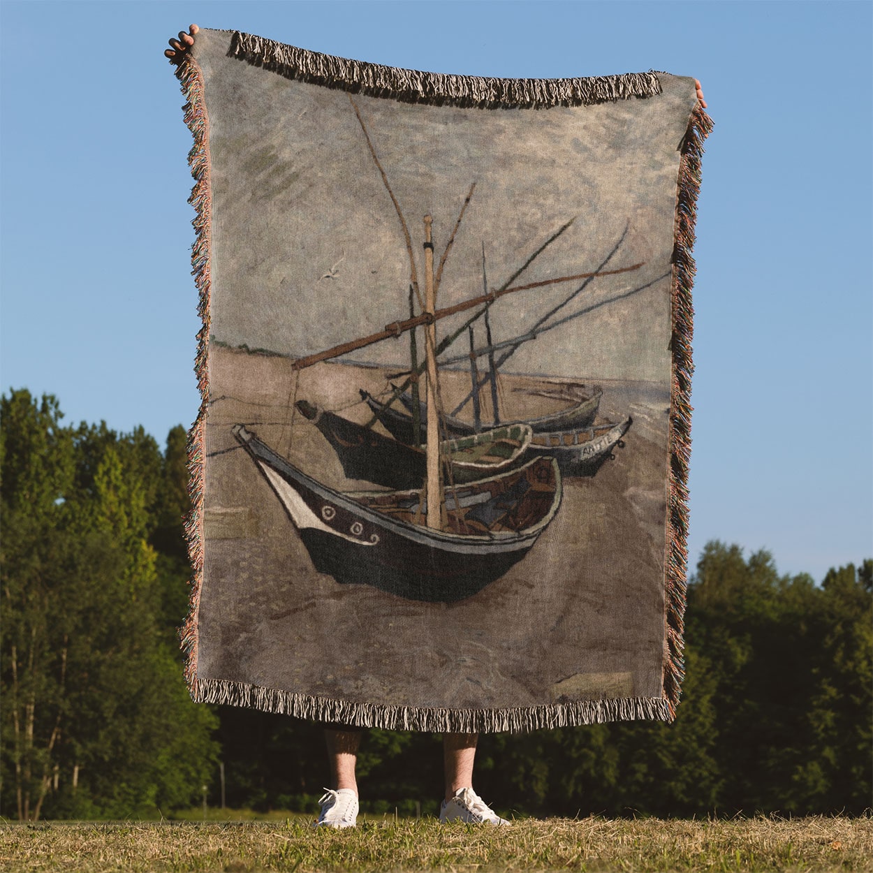 Costal Woven Throw Blanket Held Up Outside