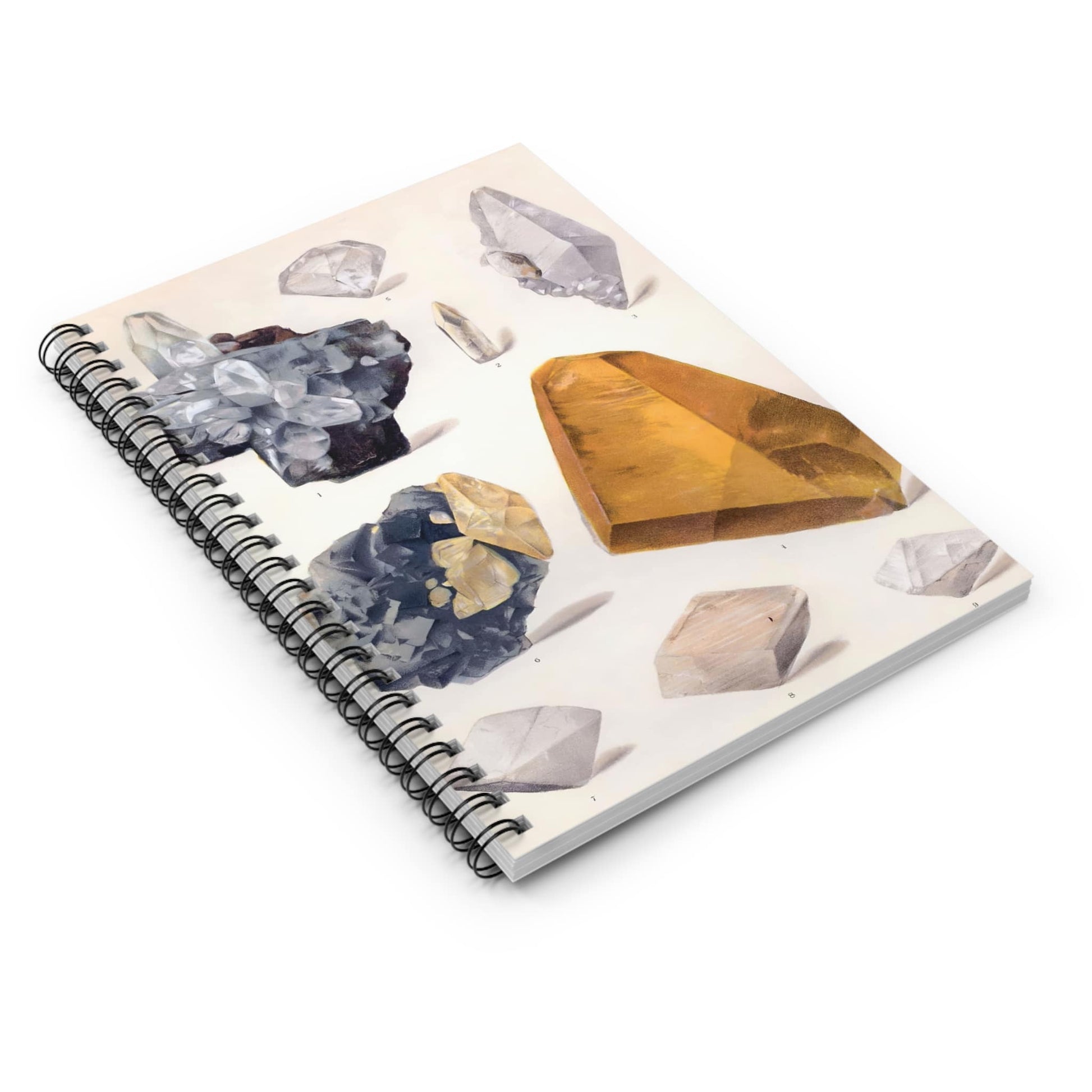 Crystals Spiral Notebook Laying Flat on White Surface