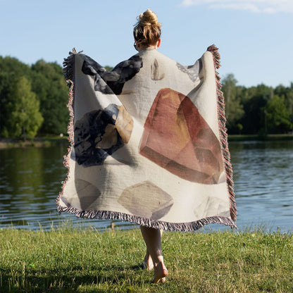 Crystals Woven Blanket Held on a Woman's Back Outside
