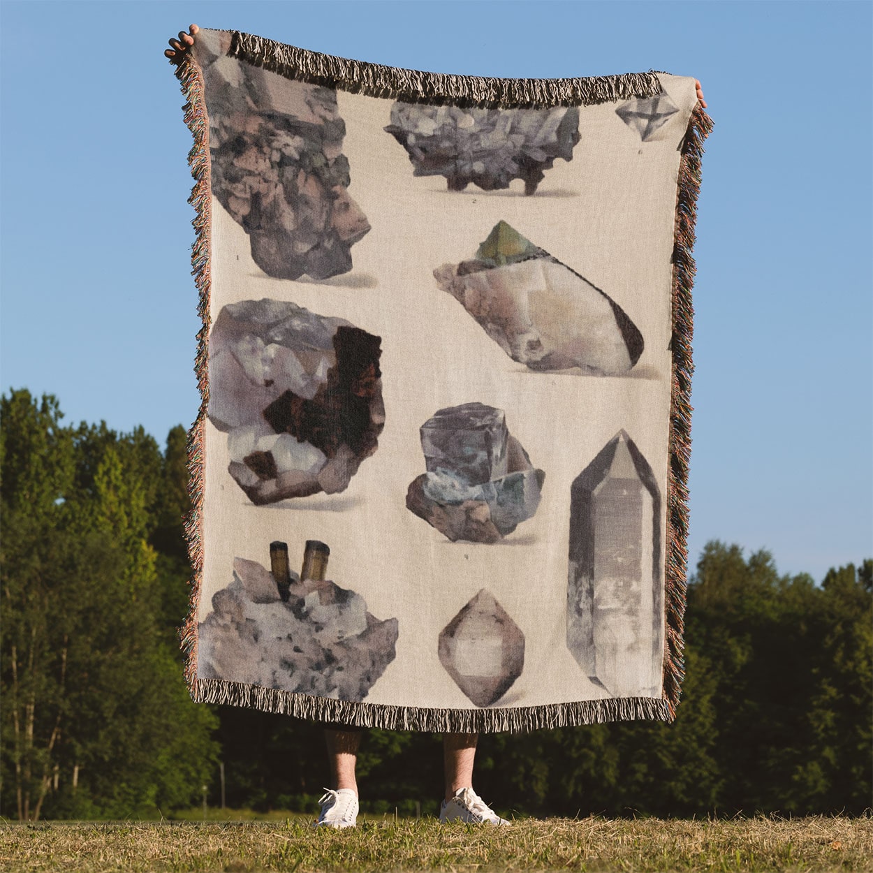 Crystals and Gemstones Woven Throw Blanket Held Up Outside