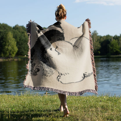 Cute Baby Animals Held on a Woman's Back Outside